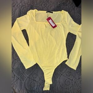 nasty gal NTW yellow bodysuit